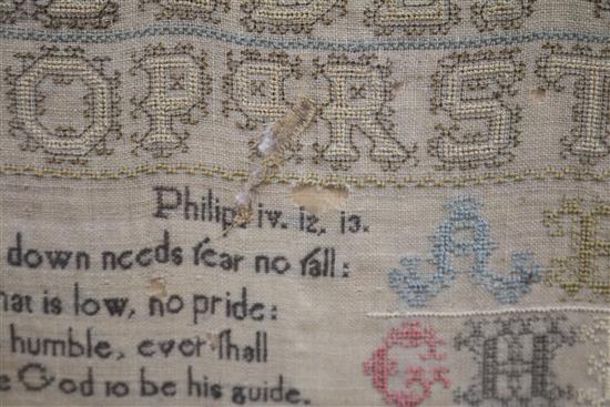 An early 19th century needlework sampler with alphabet, houses, lion, flowers and other motifs, dated 1805, 41 x 31.5cm